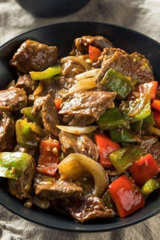 Ultimate Slow Cooker Pepper Steak Recipe.